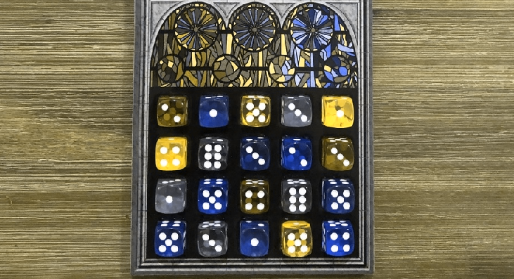 A completed game of Sagrada, showing off the variety of colors used by the translucent dice, with simulated deuteranopia.