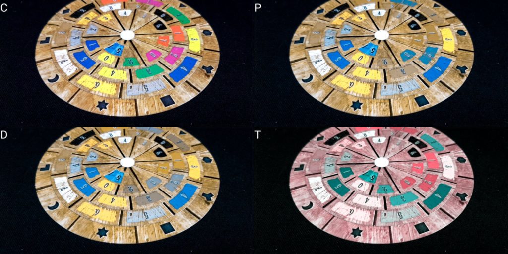 Decoder disk from Exit: The Game, The Abandoned Cabin, rendered in normal color vision and simulated colorblindness for the three most common types of colorblindness.